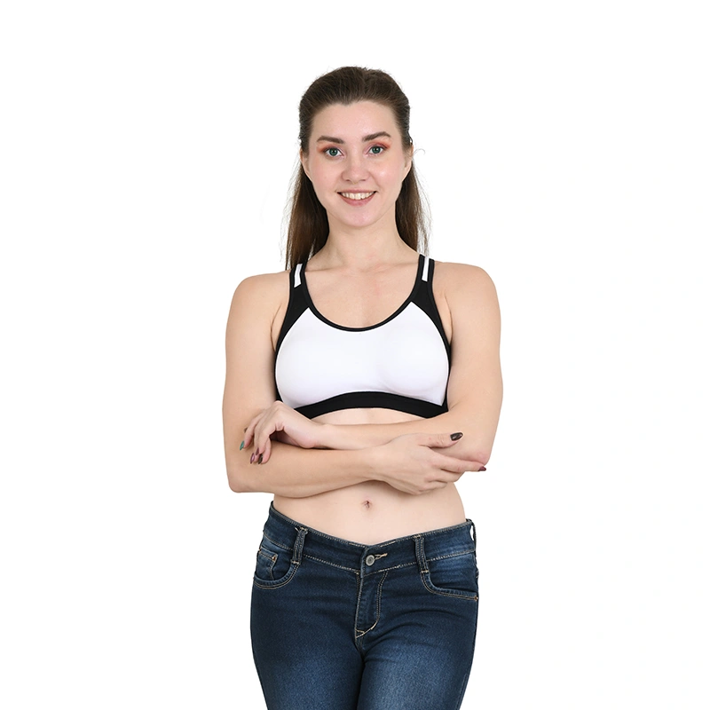 White and black colorblock racerback sports bra with blue denim jeans, front view - lingerie ecommerce photography by Lohar Studio Delhi